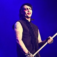 Marilyn Manson on stilts